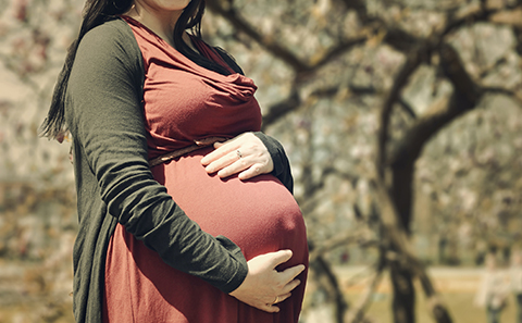 Pregnant woman outside